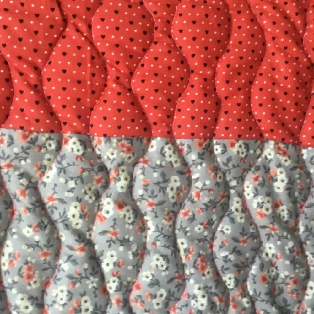 NWT. Hand Crafted Quilt in Corals